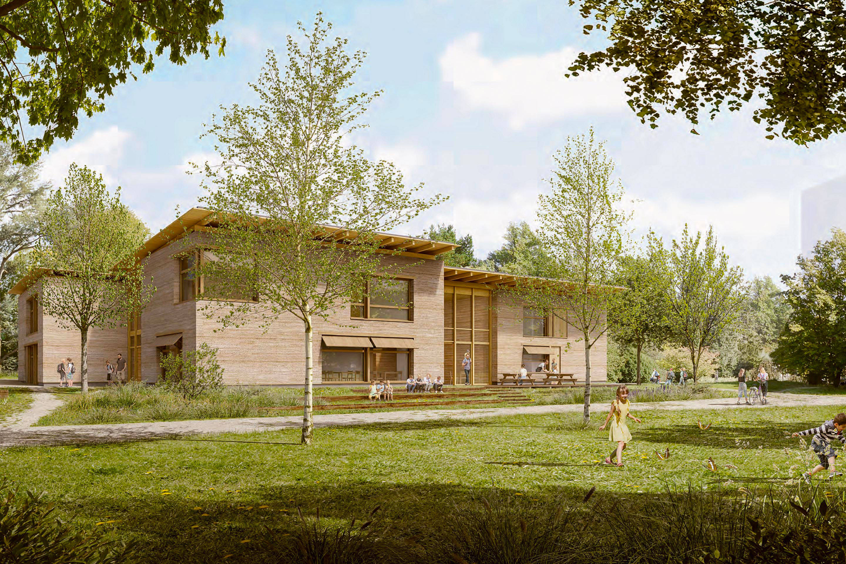 Les Cabanes du Loup, projet lauréat. Vue depuis le parc, côté PPA 1. La maison de terre est plongée dans un cadre de verdure, alors qu’on devine au loin les gabarits du futur quartier.