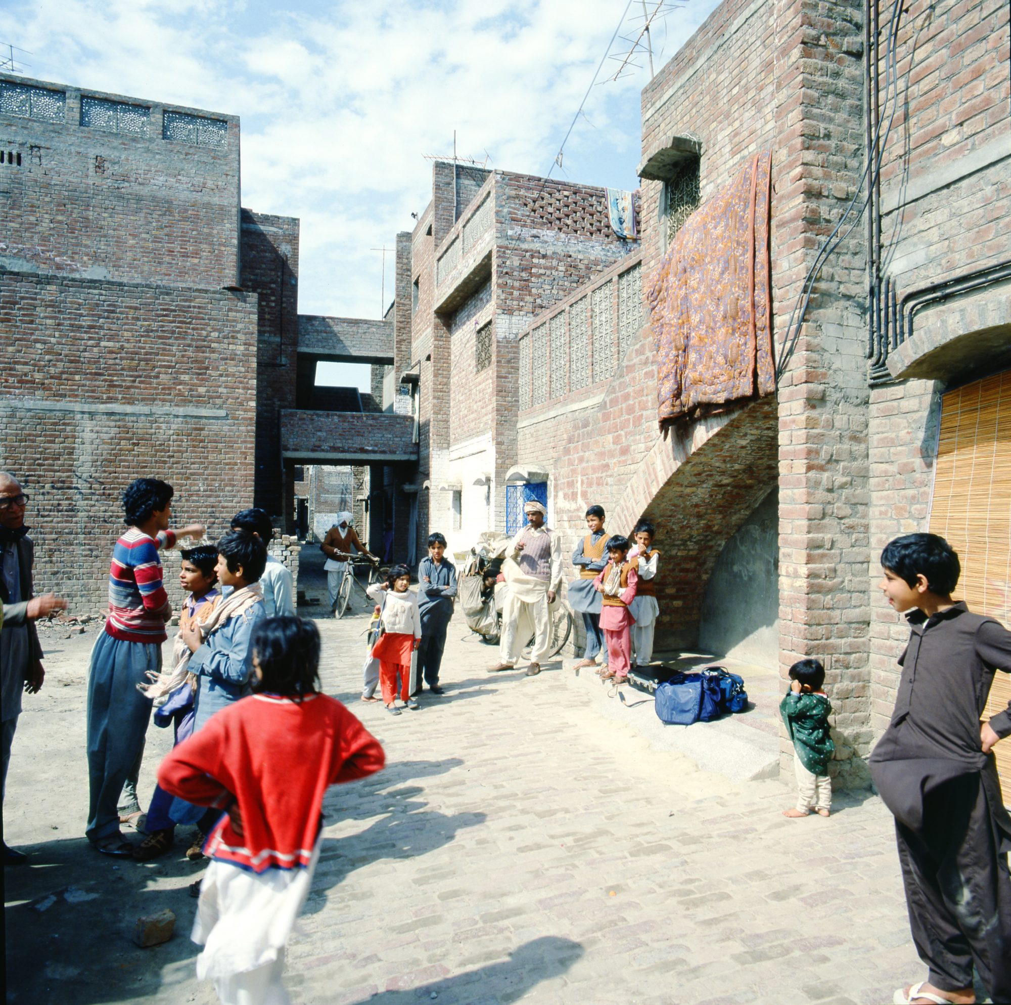 Anguri Bagh Housing, Lahore, Pakistan, 1972–73. Yasmeen Lari (b. 1941). Exterior view. c. 1980. Photograph: Jacques Bétant.
