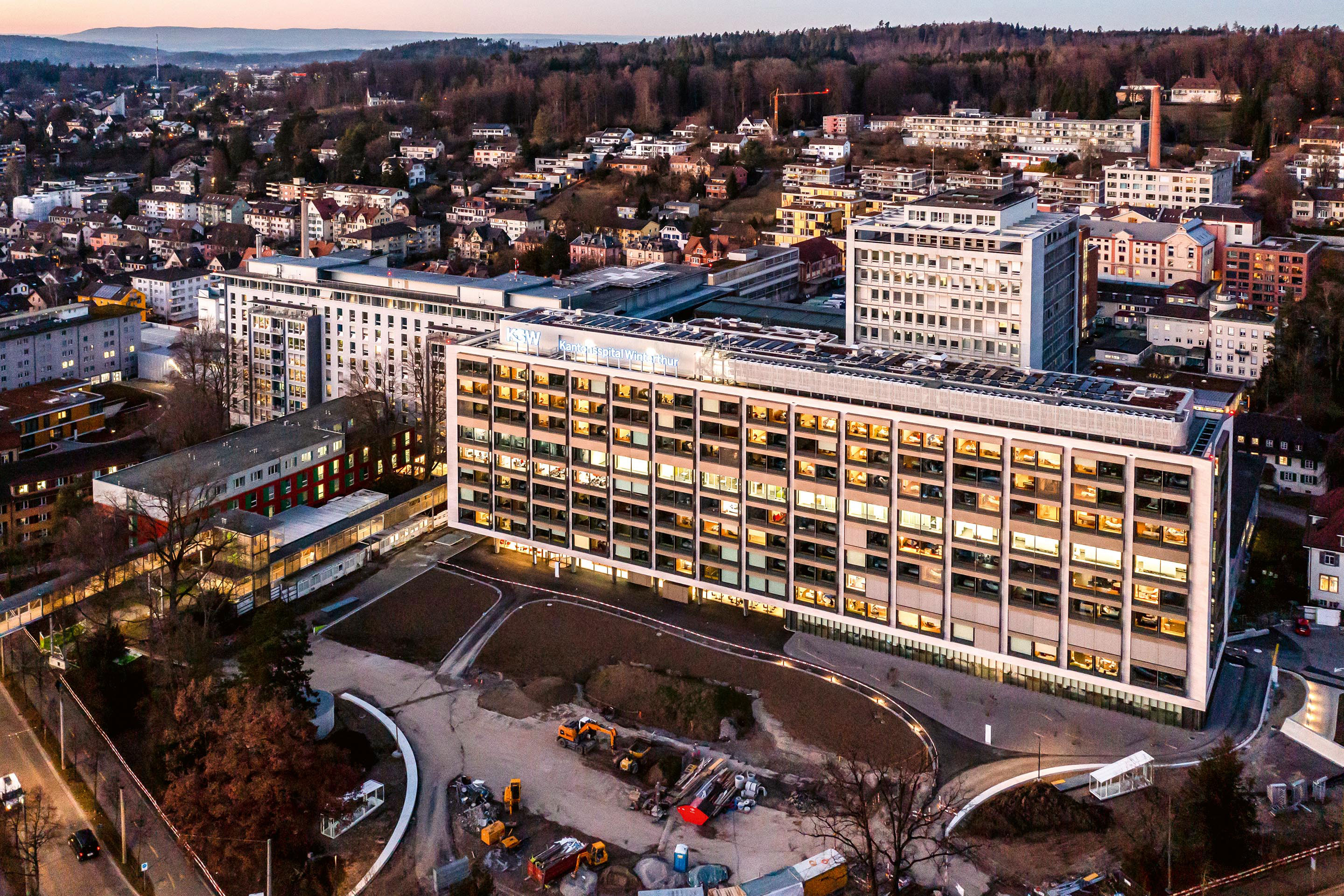 Der Ersatzneubau «Didymos» bündelt verschiedene Funktionsbereiche. Das Hochhaus dahinter wird bis Ende 2023 rückgebaut.