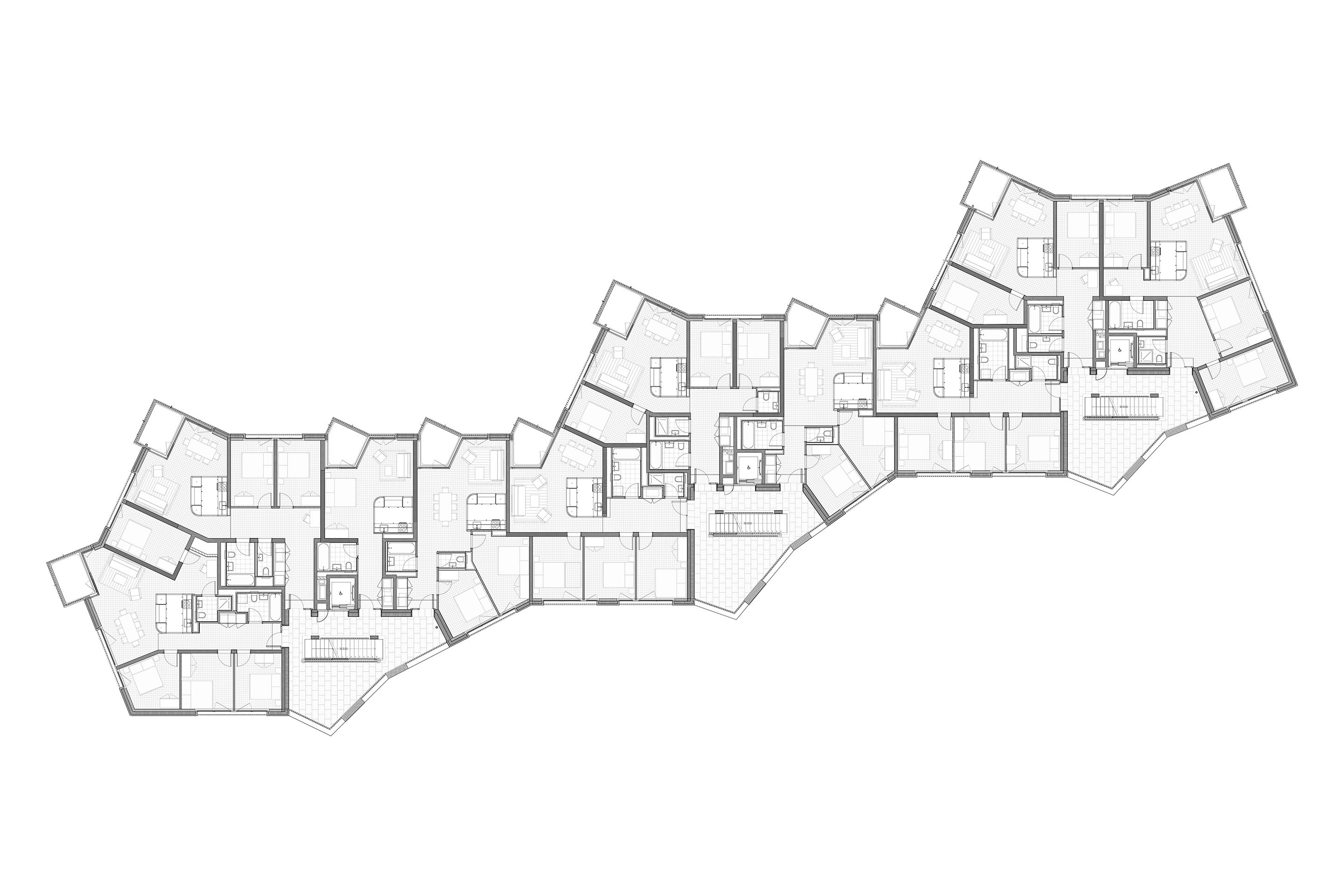 Plan d’étage impair. L’espace en redent côté rue est ouvert sur les étages pairs pour offrir une loggia commune en double hauteur à plusieurs appartements.