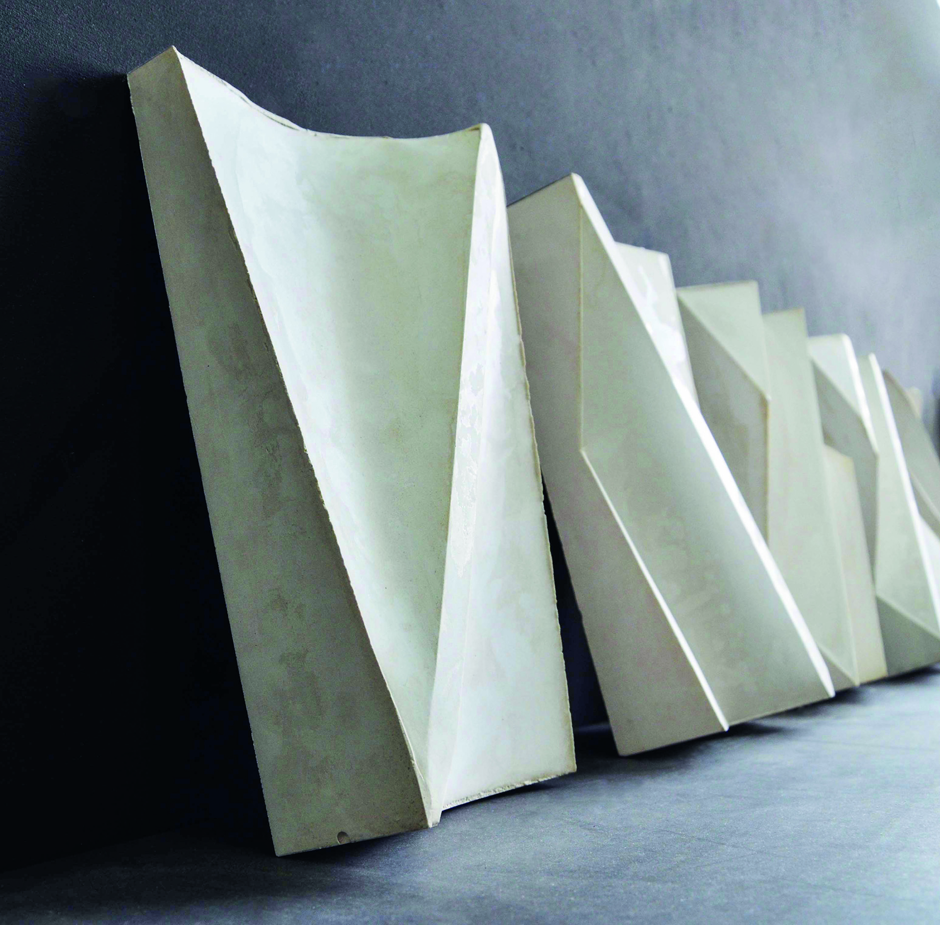 Variazioni di design realizzati con casseforme cartacee, modelli in scala 1:10