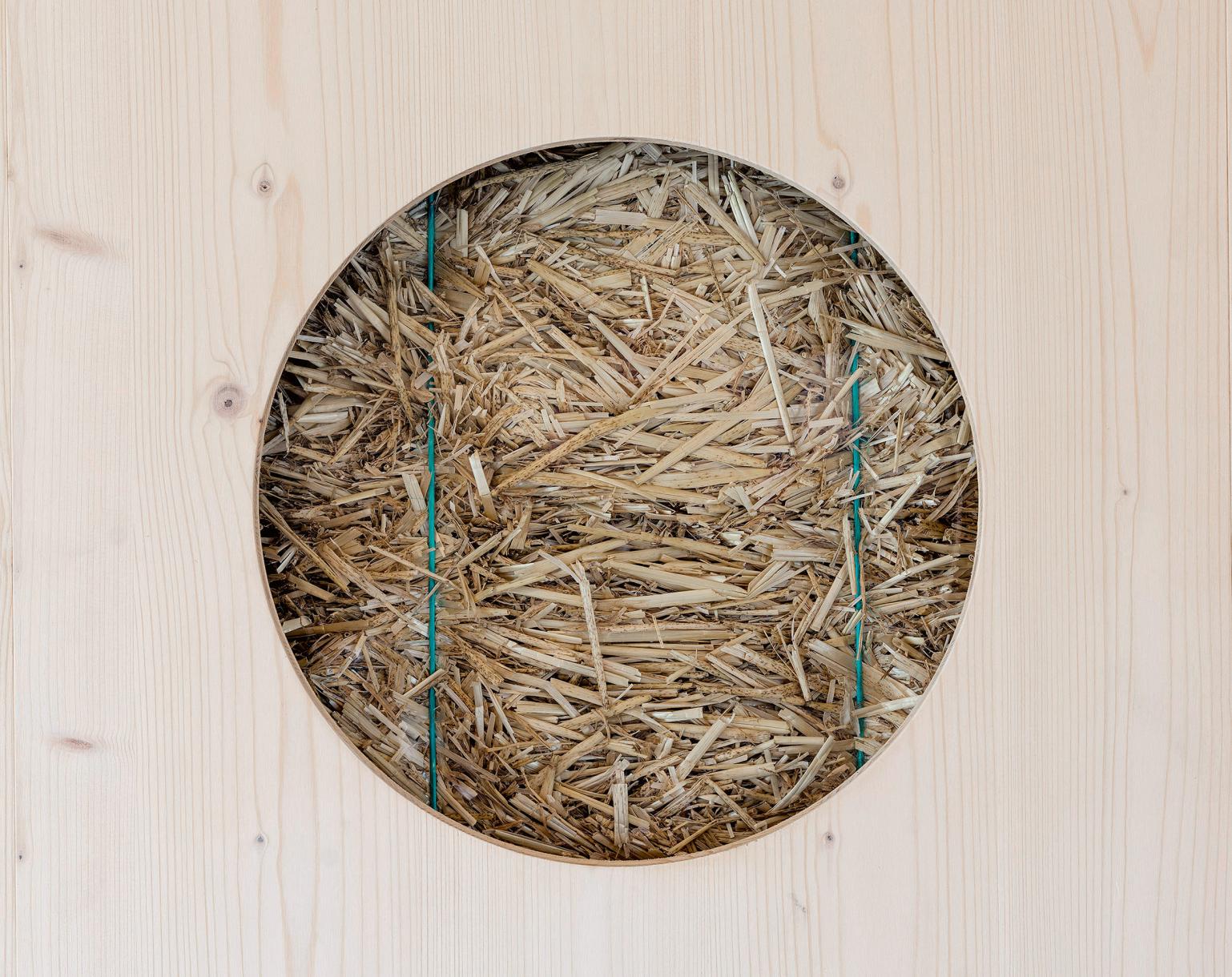 The four volumes are insulated with straw bales supplied by local farmers.