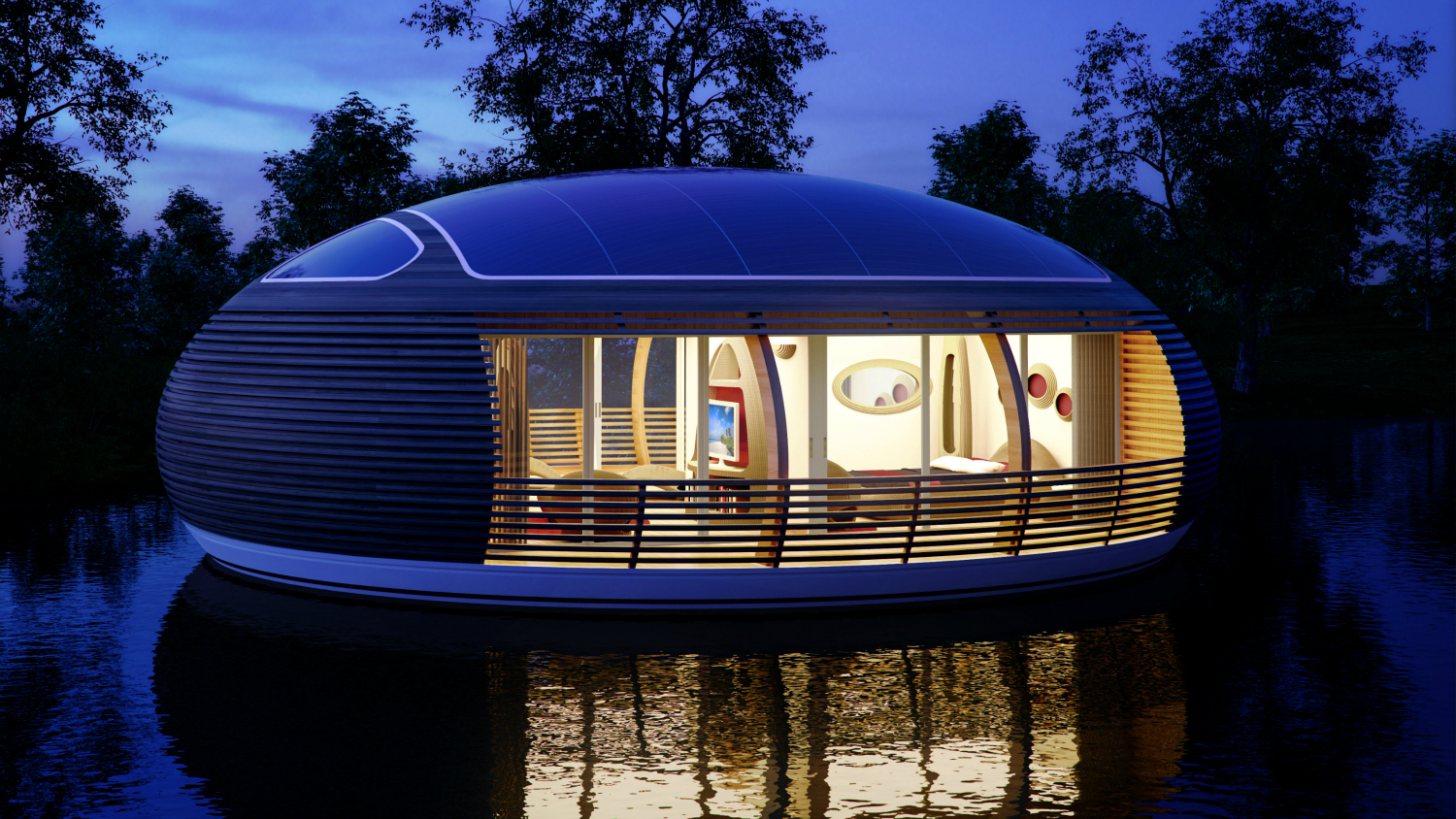 Visione notturna di Waternest 100, abitazione galleggiante progettata da Giancarlo Zema Design Group per EcoFloLife.