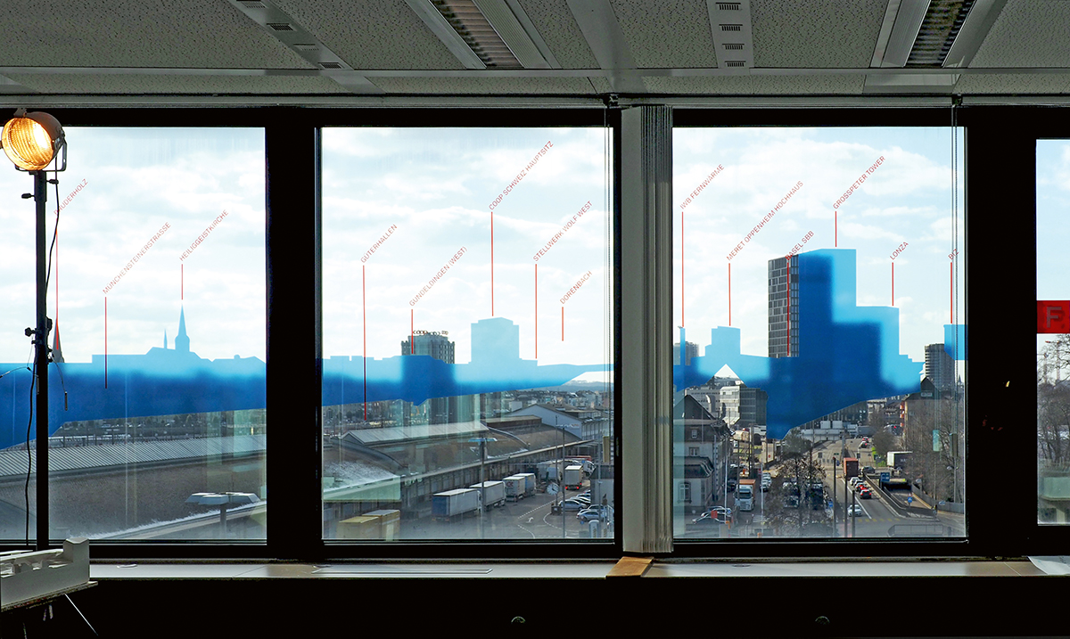 Skyline von Basel. Das Areal Wolf befindet sich in der Bildmitte.