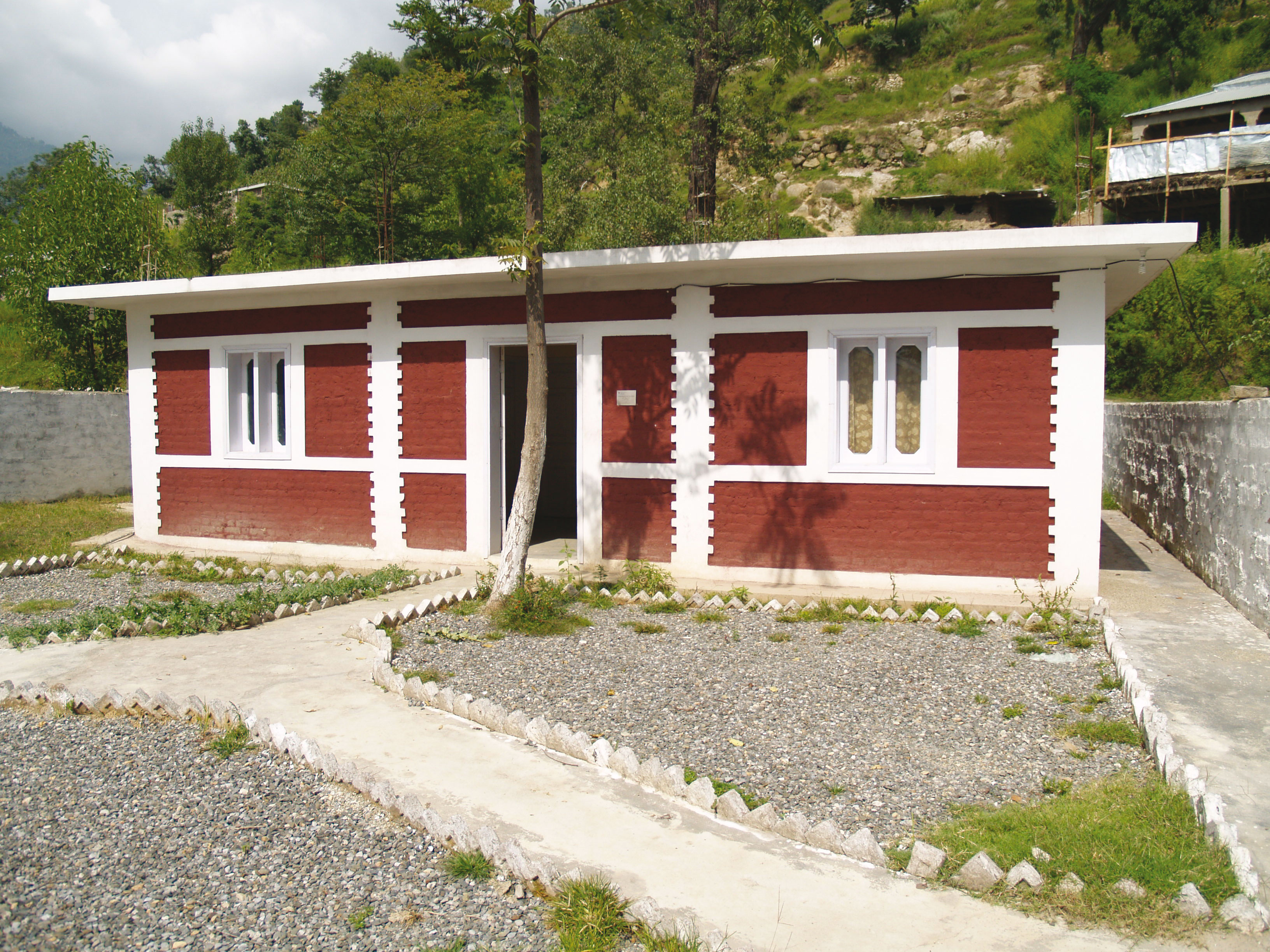 Maison de démonstration au Pakistan construite selon le système de maçonnerie chaînée